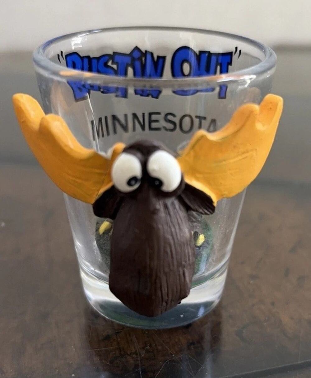 Vintage novelty "Bustin out Minnesota" shot glass moose antlers